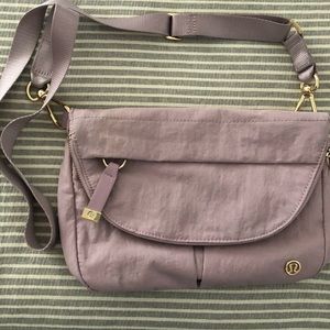 Super cute lavender canvas cross body bag in good condition! Used only 2 times